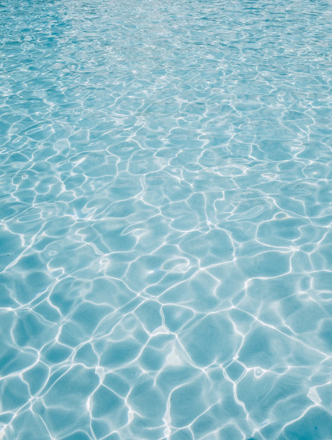 Swimming With Vitiligo: Sunscreen, Chlorine, and Waterproof Cover